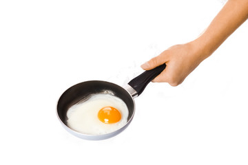 a pan in hands on a white background