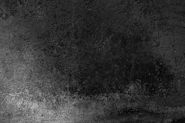 Obraz premium Abstract black background. Black stucco texture. Dark rough surface.