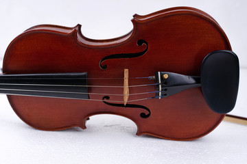 Fototapeta premium Front side of violin put on background,show detail of string instrument