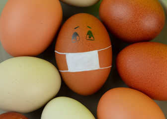 Easter egg in medical mask virus protection against coronavirus.