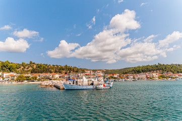 Obraz premium Nea Skioni, Greece - September 06, 2019: Panorama of resort of Nea Skioni, Kassandra, Chalkidiki, Central Macedonia, Greece