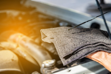 Hand mechanic in repairing car,Change the Oil.Car maintenance, concept.