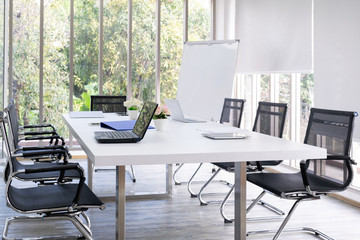 Close-up of table with laptop in meeting room. concept for business