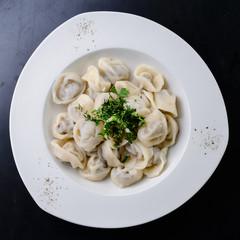 boiled dumplings in a white plate