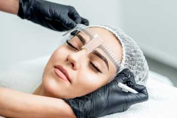 Markup with ruler on brows.