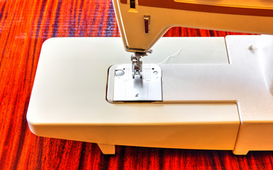 Modern sewing machine close up view