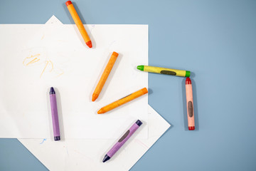 top view of table with crayons and paper. drawing concept - 330143826