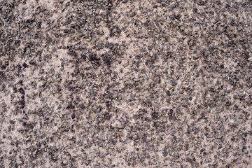 Texture of the wall made of concrete and stone chips. Structure.