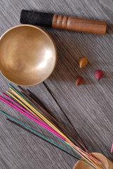 incense cones, sticks and tibetan bell, close up of group of object