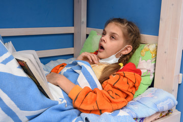 Tired sick girl prepares to once again sneeze lying in bed