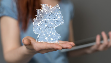 a virtual germany land  map digital in hand 3d