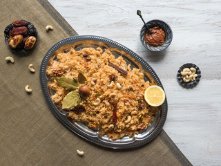 Vegetable Biryani, Vegetarian dish on a black table. Top view. 