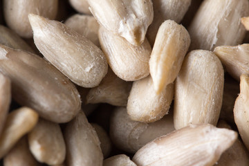 peeled sunflower seeds as background