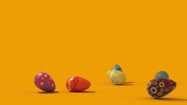 falling easter eggs on a uniform background