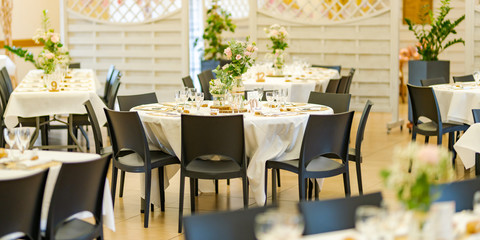 Restaurant table set for a wedding banquet