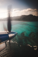 Small propeller plane flying from San Andres to Isla de Providencia, a Colombian paradise island in...