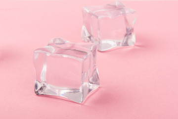 ice cubes close up on rose background