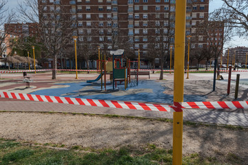 Fototapeta na wymiar closed and empty children playgrounds in Spain because of coronavirus, covid-19, crisis