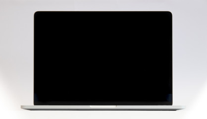 laptop computer in silver with black screen for use as a background