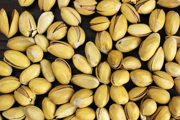 Macro pistachio nuts in shell, background, texture
