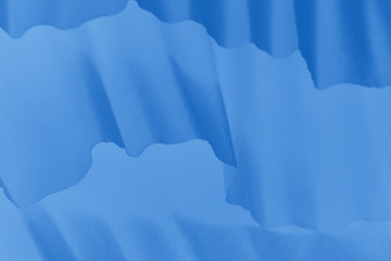 Fototapeta premium Blue abstract gradient background with paper waves