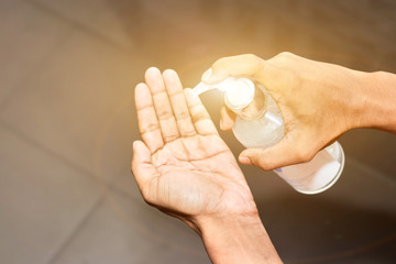 Hand of peple are push pump bottle applying alcohol gel or anti bacteria soap to make hands cleaning and clear germ, bacteria,corona virus
