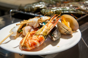  delicious grilled mixed seafood on plate