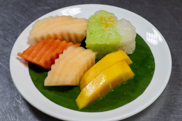  fresh mixed fruit on white plate