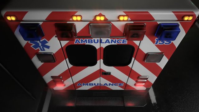 Rear of Ambulance with Flashing Emergency Lights in Dark Studio