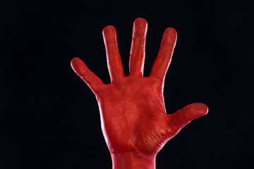 red bloody palm on a black background