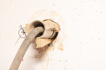 Wall breakthrough through a core drilling by professionals with the aid of a machine