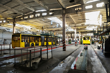 Trolleybuses parked at the trolley depot hangar for technical inspection, depot maintenance