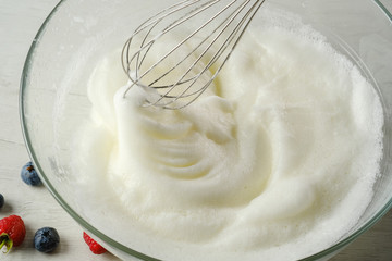 The process of making dough for pancakes.