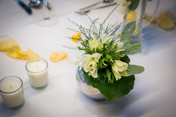 Table decor with yellow flowers