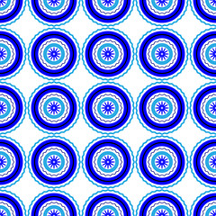 Vector continuous pattern of circles and zigzags in blue, white and black.