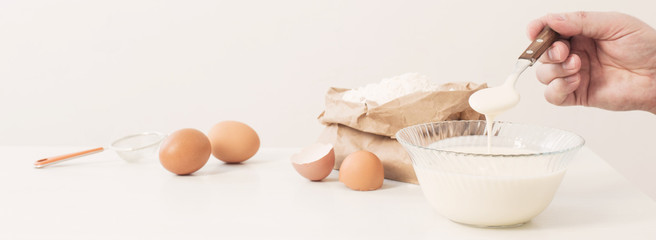 dough in glass plate and products for its preparation on  white