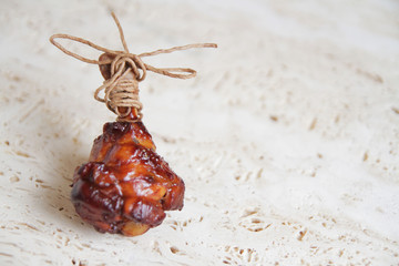  fried chicken wings with the addition of soy sauce and chili, aesthetically laid out on a marble table