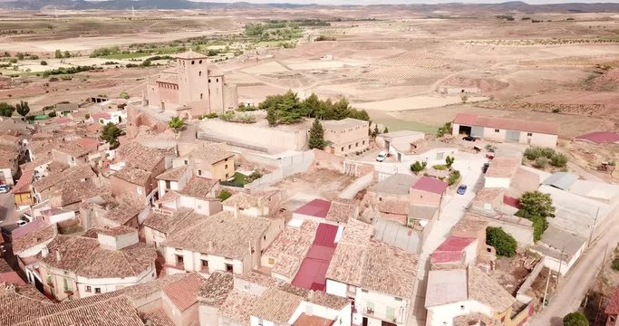 View from drone of Spanish village Cervera de la Canada and church of Santa Tecla, part of the UNESCO World Heritage Site