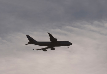 Airliner jumbo silhouette flying