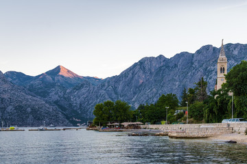 Sunny morning view of Kotor bay near village Dobrota, Montenegro.