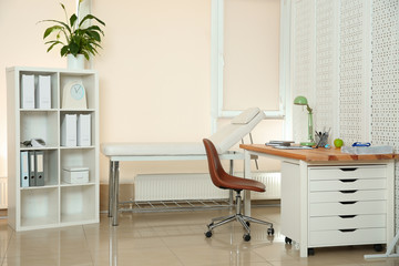 Modern interior of doctor's office with workplace