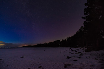 night sky over a frozen lake