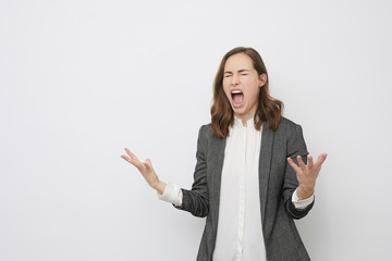 angry businesswoman is screaming in frustration