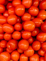 lots of ripe delicious red tomatoes for eating like a background