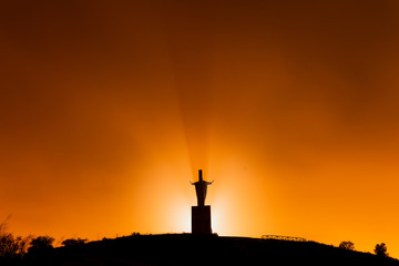 Monument Sagrado corazón de Jesus on top of mountain Naranco in Oviedo at night, Asturias. Religion. 