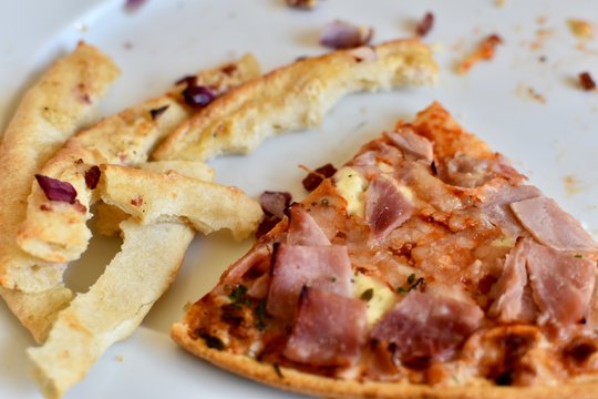 Slice Of Pizza With Some Crusts 