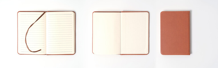 top view blank orange leather diary on white desk