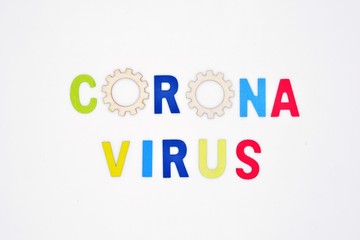La palabra corona virus, hecha con letras de colores sobre fondo blanco