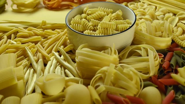 different types of pasta lie on the table