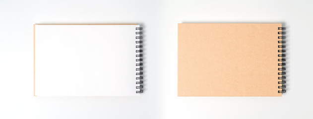 A notebook on a spring. Isolated on white background.